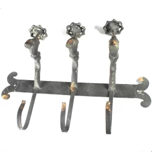 • Front view of the 15-3/4 inch by 10 inch Vintage Faucet Hook Wall Rack showing its rustic dull finish and antique metal patina.