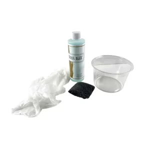 • Complete contents of the All-In-One Brassager Kit showcasing the 8oz bottle, dipping container, steel wool, and gloves on a clean surface.